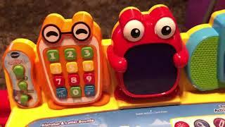 Playing with the Vtech touch and learn activity desk!!