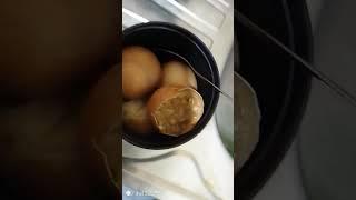 Boiling eggs with lentils one egg crack into pieces, MercyNguku The World Traveller 