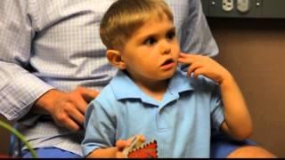 Deaf child hears for the first time