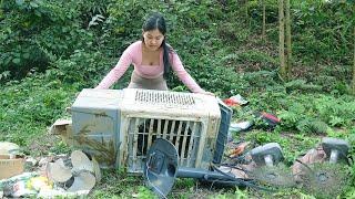 The girl repair, restore, large capacity steam air conditioner fan in junkyard