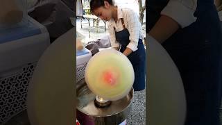 It's huge! King cotton candy made by a Thai girl!