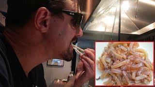 Drinking Squid Ink & Eating Squid GUTS | Whoa That's Weird