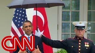 Obama asks Marines for umbrellas