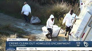 City crews clean up homeless encampment in San Diego riverbed