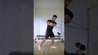 Rotazioni con elastico a gambe divaricate (in affondo) | Standing Band Core Rotation