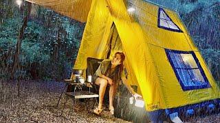 Solo camping in a mess in a leaky inflatable tent in heavy rain