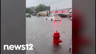 Long Island family rescued from car stuck in flooded waters | News 12