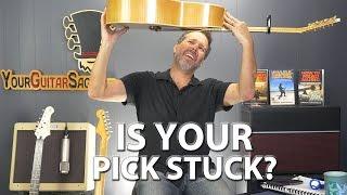 The Fastest and Easiest Way to Get a Pick Out of an Acoustic Guitar