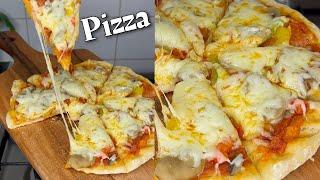 Pizza à la poêle fait maison , pate à pizza maison également