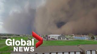 Dust storm darkens sky as it sweeps across South Dakota city