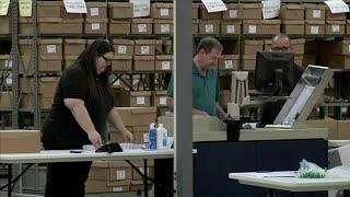 Palm Beach County vote counters deal with machines overheating