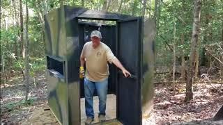 Setting up the deer blind in the woods