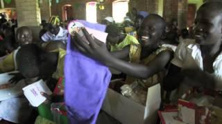 Operation Christmas Child - Sudan Girls Opening Boxes