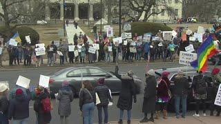 People on both sides rally in Hartford ahead of President Trump's address to Congress