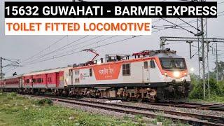 UNIQUE LOOKING URINAL SYSTEM FITTED KANPUR WAP7 with 15632 GUWAHATI - BARMER EXPRESS arrives NJP