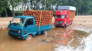 RC TRUK TERJANG BANJIRTRUK FUSO DAN PICK UP CERRY FULL MUATAN NEKAT TEROBOS BANJIR Versi Miniatur