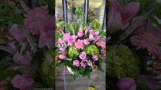 Pink and green floral design.