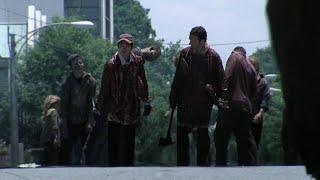 TWD S1E2 -- Rick and Glenn's disguise as a walker disappears due to rain | They fight their way |