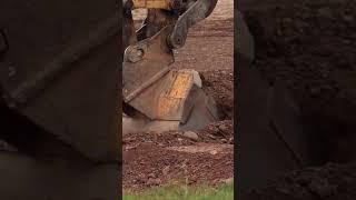 Bucket Attachment Close up scooping dirt and rocks hydraulic excavator #postmymachine