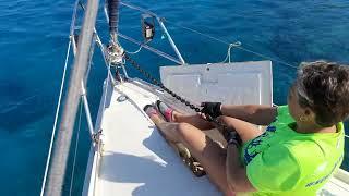 FEMALE SAILOR ANCHORING UP MANUALLY WITHOUT A WINDLASS