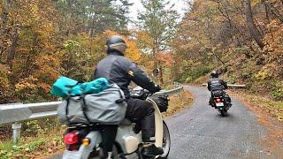 Moto Camping Running along the Autumn Rain