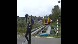 Train crossing incredible big road junction manually