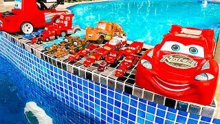 Disney Pixar Cars falling into deep pool, Lightning McQueen, Tow Mater, Mack, Sally, Francesco