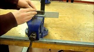 how to use a hacksaw.wmv