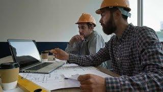 Two Engineers Working Together in Office | Stock Footage - Videohive