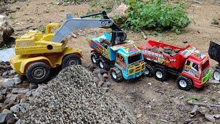 Construction vehicles, trucks loaded with crushed stone,trucks loaded with soil, extreme bridges