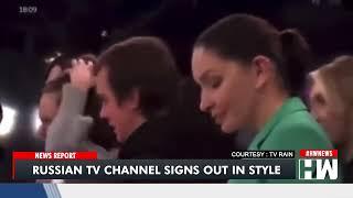 Russia's raintv took off the air and employees walk out on live TV.