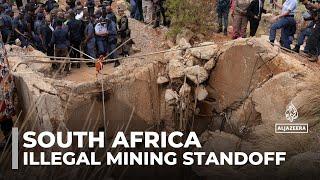 South Africa's illegal mining standoff: Families say 4,000 workers are trapped underground