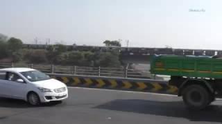 Parallel action with Mumbai local trains on Vashi Bridge