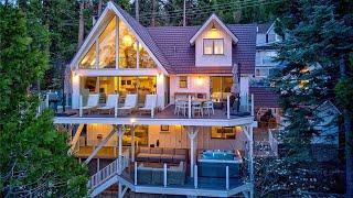 This $5,999,000 one of a kind luxury lakefront home in Lake Arrowhead CA with stunning forest views