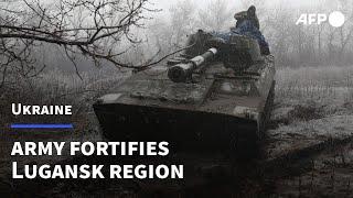 Ukrainian army fortifies Lugansk region as Russia closes in | AFP