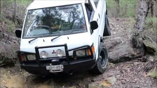 L300 4WD van and Nissan Patrol testing a rocky 4x4 track