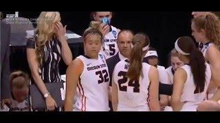 OSU coach getting dwarfed by his women basketball team during huddles