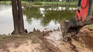 Mini ex Cutting a Spillway in! Kubota CAT Excavator Trackhoe