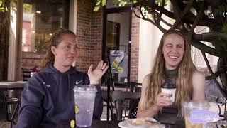 Coaches in a Car Getting Coffee