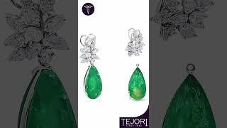 A pair of exquisite Diamond and Emerald earrings with a detachable design. #uaejewellery #diamond