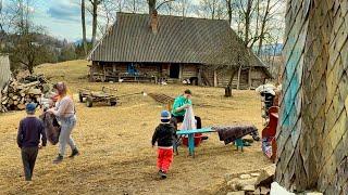 Travel to a large family to the top of a mountain away from civilization