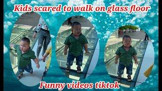 TRY NOT TO LAUGH .KIDS SCARED TO WALK ON GLASS FLOOR //FUNNY VIDEOS TIKTOK