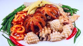 Cooking Octopus, Cuttlefish, Squid, fish market in Thailand