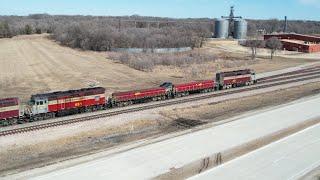 SLUG ON SLUG! IOWA NORTHERN POWER WORKS INTERCHANGE AND CANADIAN NATIONAL L571. DRONE VIEWS!
