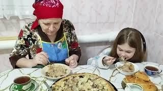 Cooking tatar national dish. Life in a village in Russia in winter.