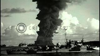 Burning USS Mississinewa torpedoed at Ulithi in Pacific. HD Stock Footage