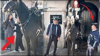 Guard charges his Horse Forward and SHOUT at the Ignorant Tourists get in the box.