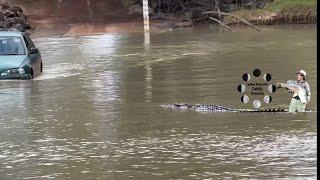 A car and a crocodile at Cahill’s Crossing