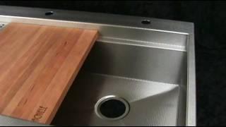 Top mount copper and stainless apron front sinks by Rachiele