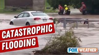 Firrefighters Wade Through Catastrophic Flooding In Westfield, Pennsylvania, To Rescue Family